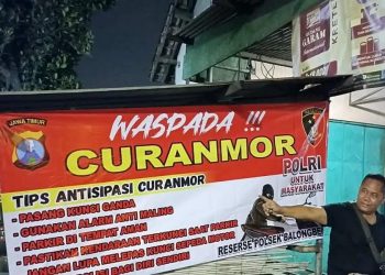 Kanit Reskrim Polsek Balongbendo Pasang Banner Himbauan Cegah Curanmor